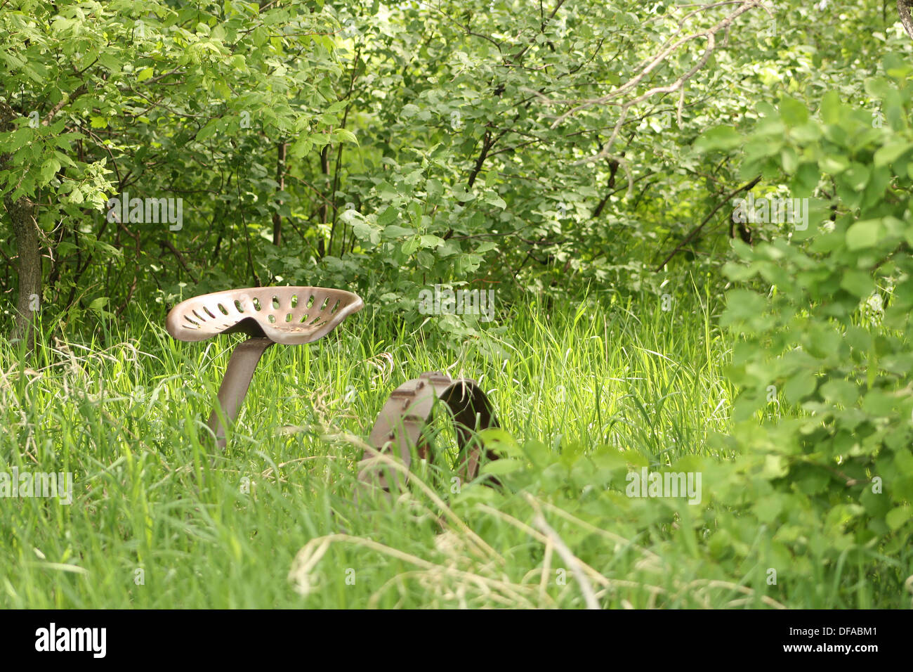 Ein verlassenes Stück antike landwirtschaftliche Geräte auf einer Weide des Bauern in Altona, Manitoba, Kanada Stockfoto