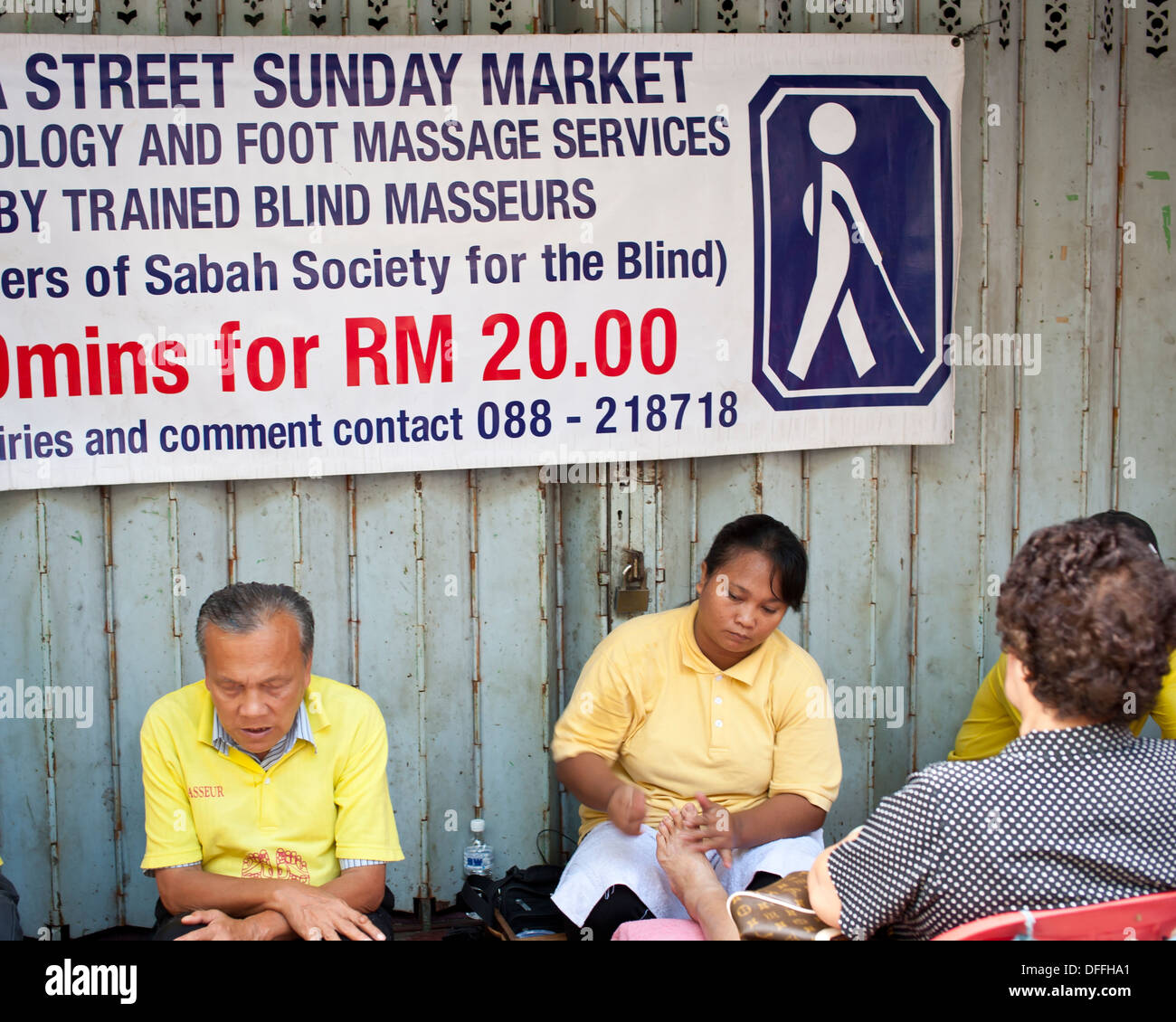 Blinde Fuß Masseure, Sabah, Malaysia Stockfoto
