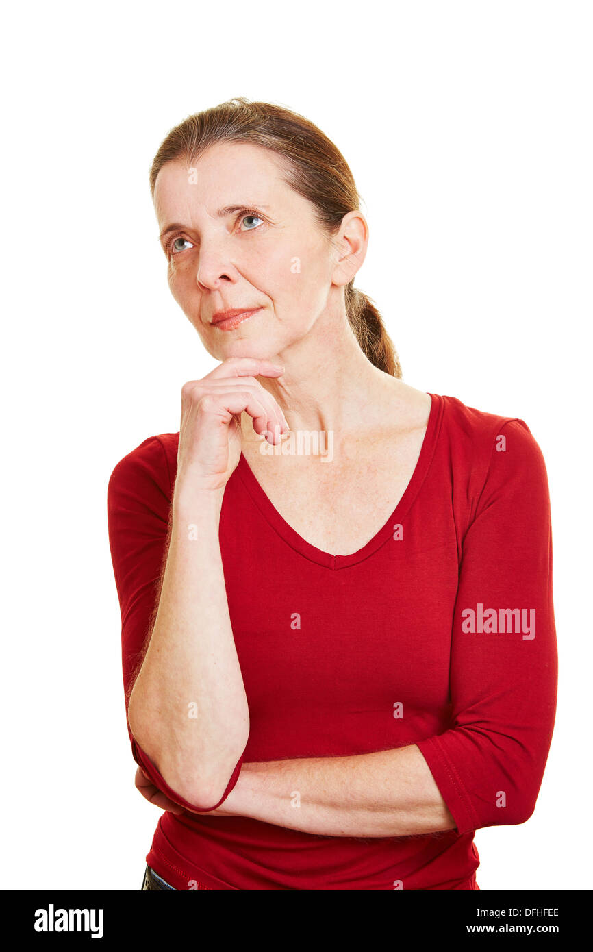 Nachdenklich senior Frau denken und nachschlagen Stockfoto