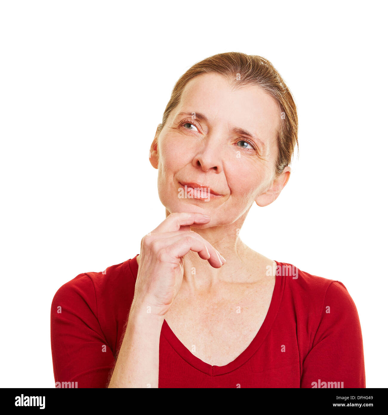 Nachdenklich Seniorin nachschlagen und denken Stockfoto