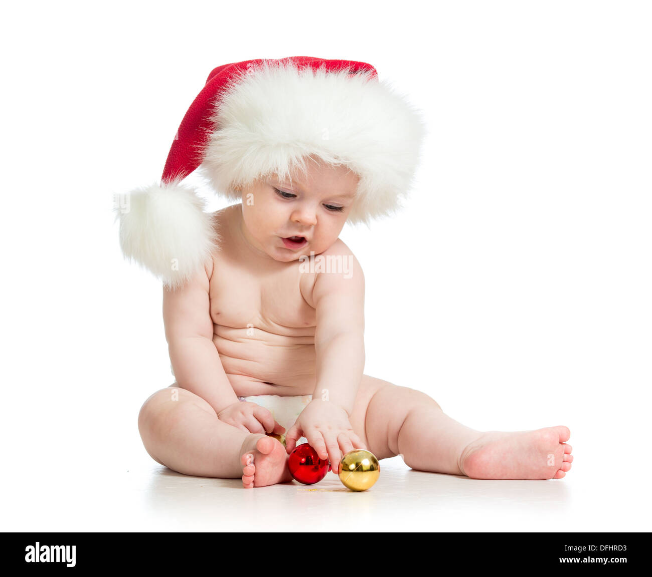 Babymädchen mit Weihnachtsmann Mütze Stockfoto