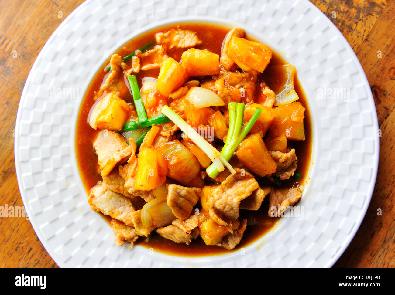 Taste of Thailand - gebratenes Schweinefleisch mit Ananas Stockfoto