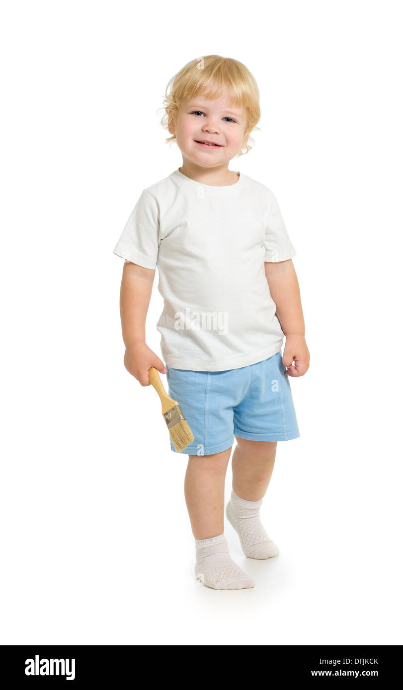 Junge mit Farbe Pinsel vorne anzeigen stehen in vollen Länge isoliert auf weißem Hintergrund Stockfoto