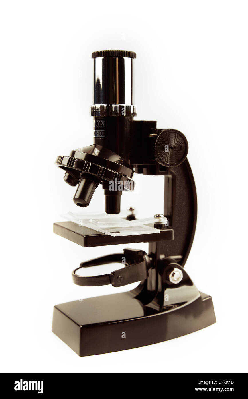 Mikroskop auf einfarbigen Hintergrund isoliert Stockfoto