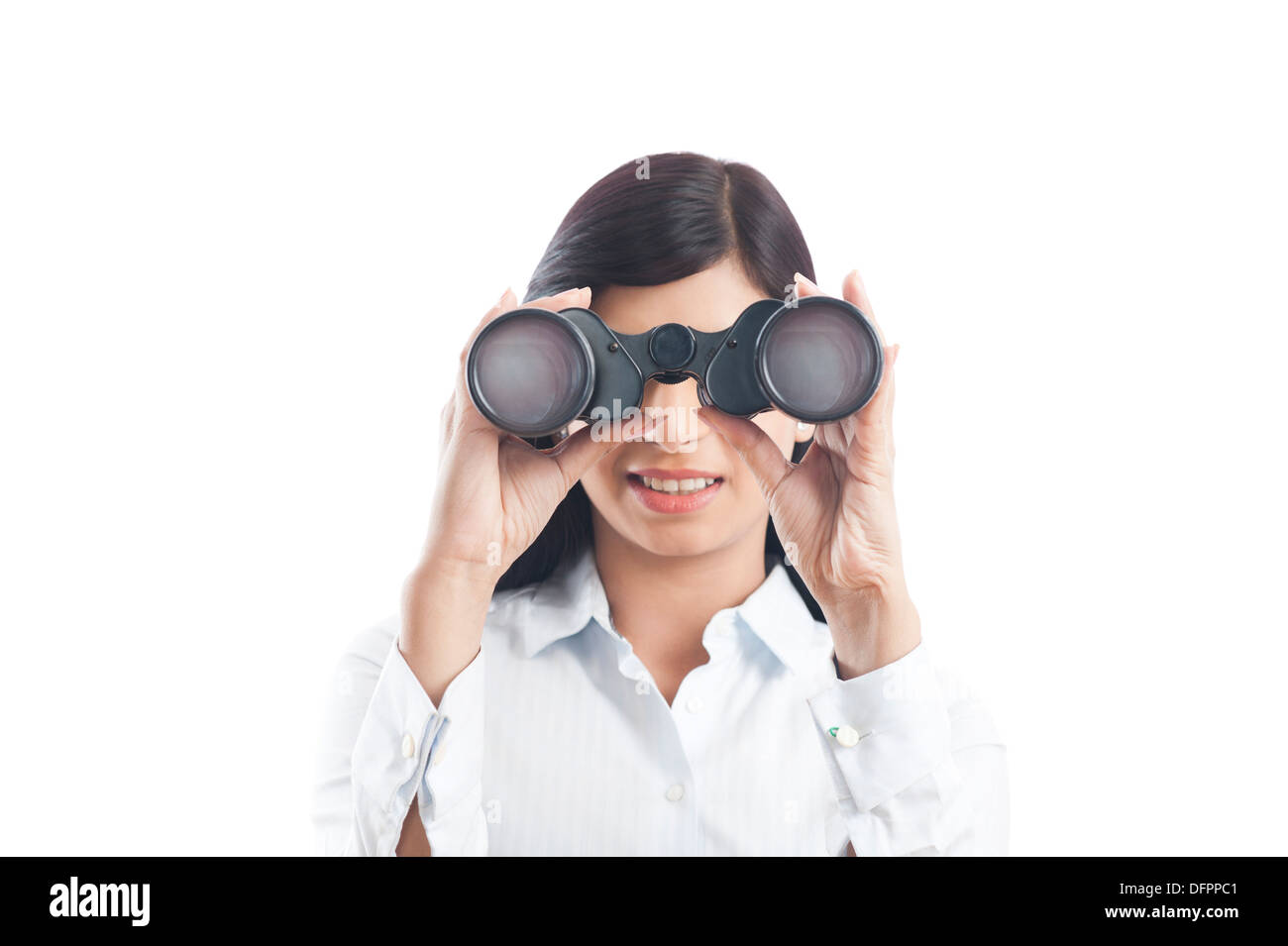 Geschäftsfrau, Blick durch ein Fernglas Stockfoto