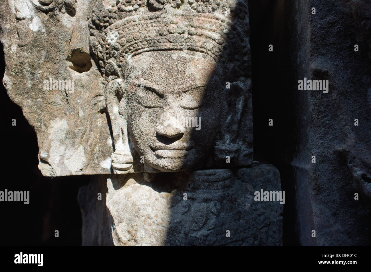 Geschnitzte Gesicht an den berühmten Bayon-Tempel in Angkor, Kambodscha Stockfoto