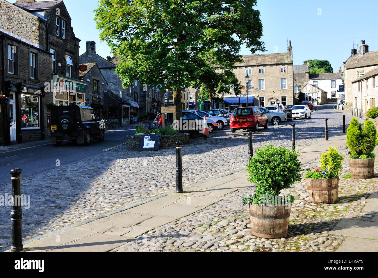 Einen ruhigen Moment, am Ende des Tages in Grassington Marktplatz, Yorkshire Dales National Park, England Stockfoto