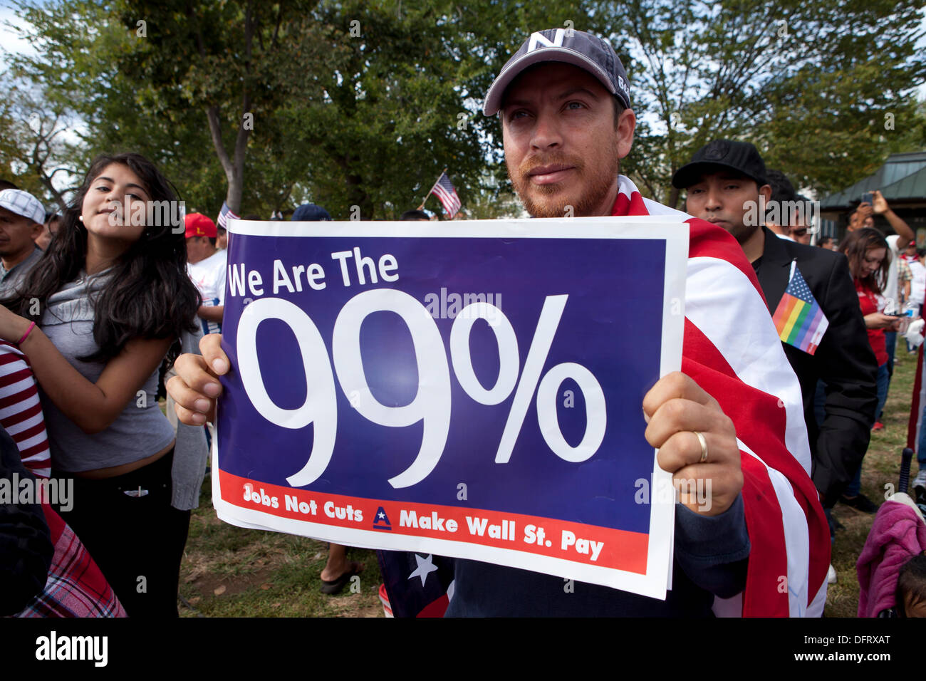Washington DC, USA. 8. Oktober 2013. Mann mit 99 % Schild bei Immigration Reform Rallye. Bildnachweis: B Christopher/Alamy Live-Nachrichten Stockfoto