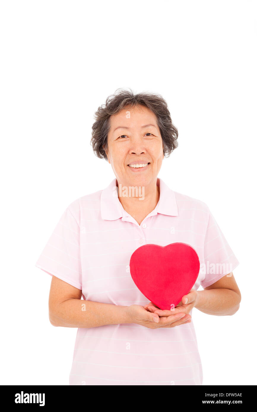 glücklich senior Asiatin mit roten Herzen Stockfoto