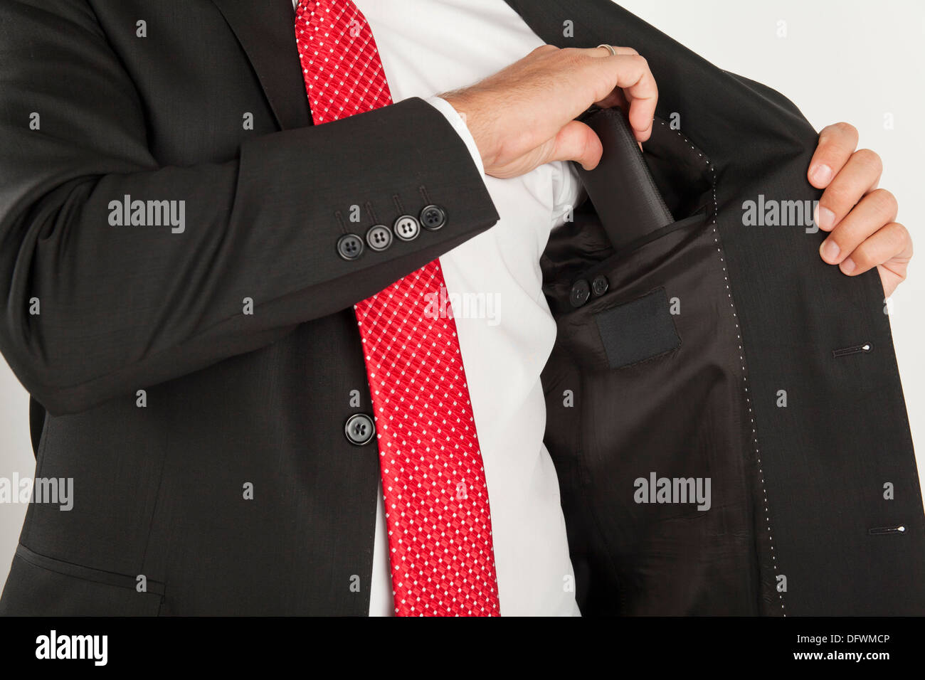 Business-Mann mit roter Krawatte isoliert Stockfoto