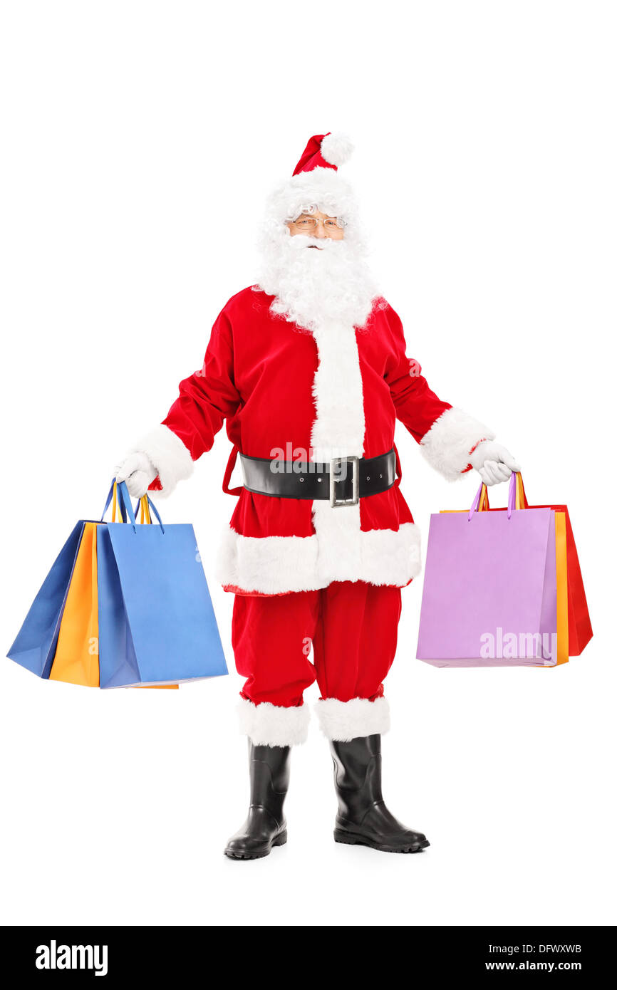 In voller Länge Portrait von Einkaufstaschen mit Weihnachtsmann Stockfoto