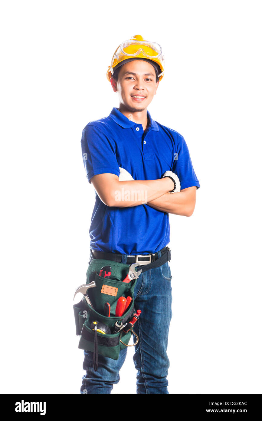 Indonesische asiatischen Builder oder Bau Arbeiter mit Helm und Werkzeug Gürtel Stockfoto