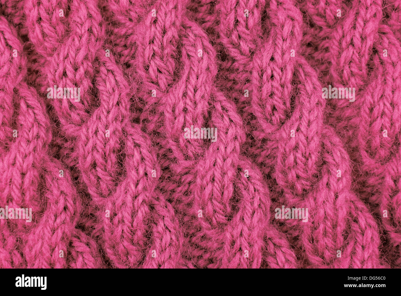 Nahaufnahme von rosa gewickelte Seil Kabel Masche stricken auf der Diagonalen Stockfoto