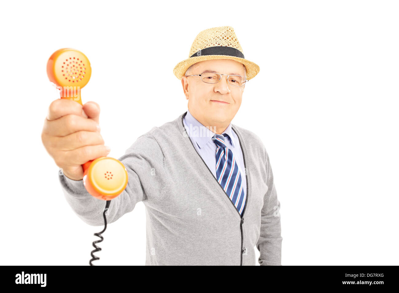 Ältere Gentleman geben ein Telefon mit jemandem sprechen Stockfoto