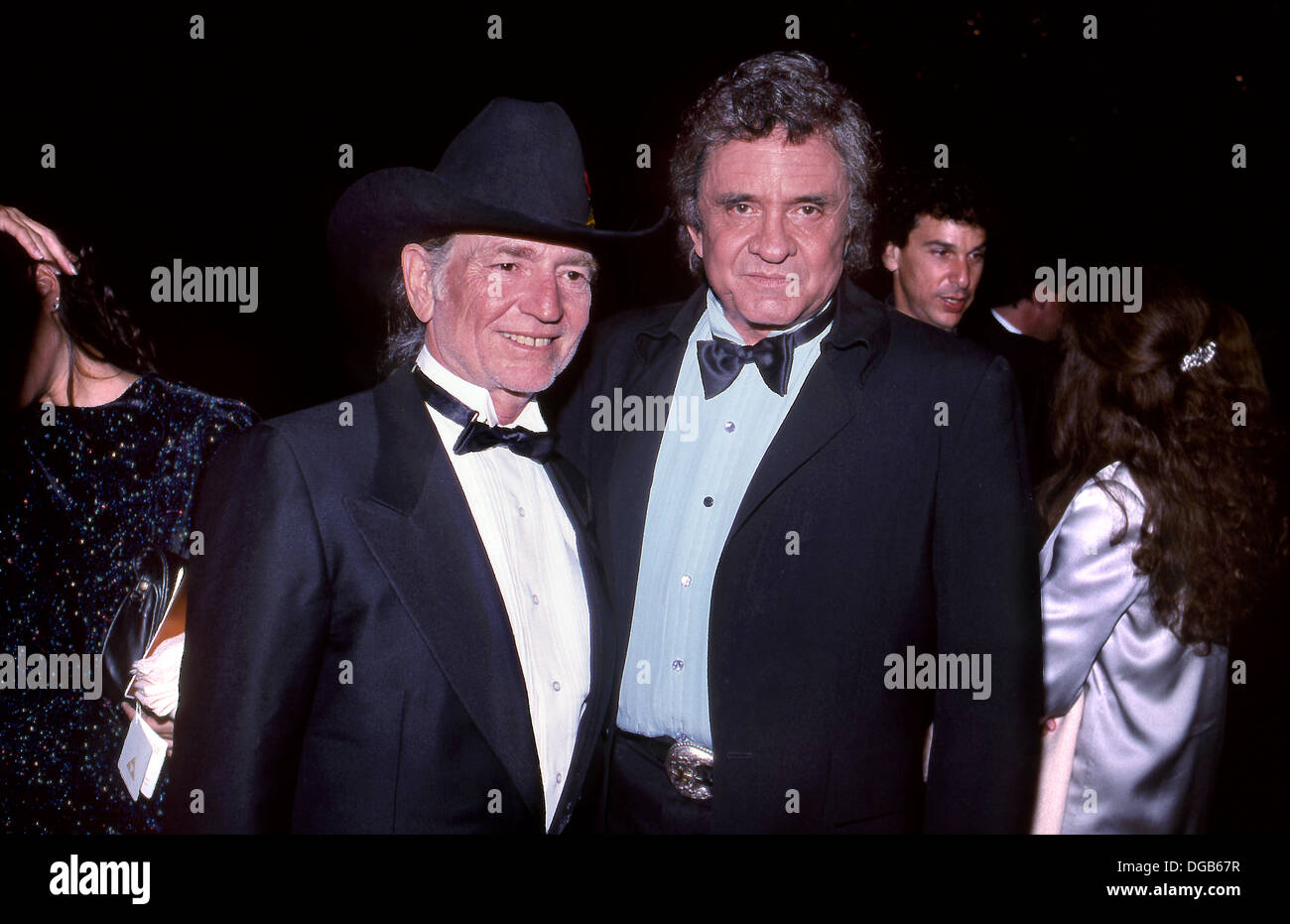 Willie Nelson und Johnny Cash nehmen an der Eröffnung des Gene Autry Museums of the American West in Los Angeles, CA, 1988 Teil Stockfoto
