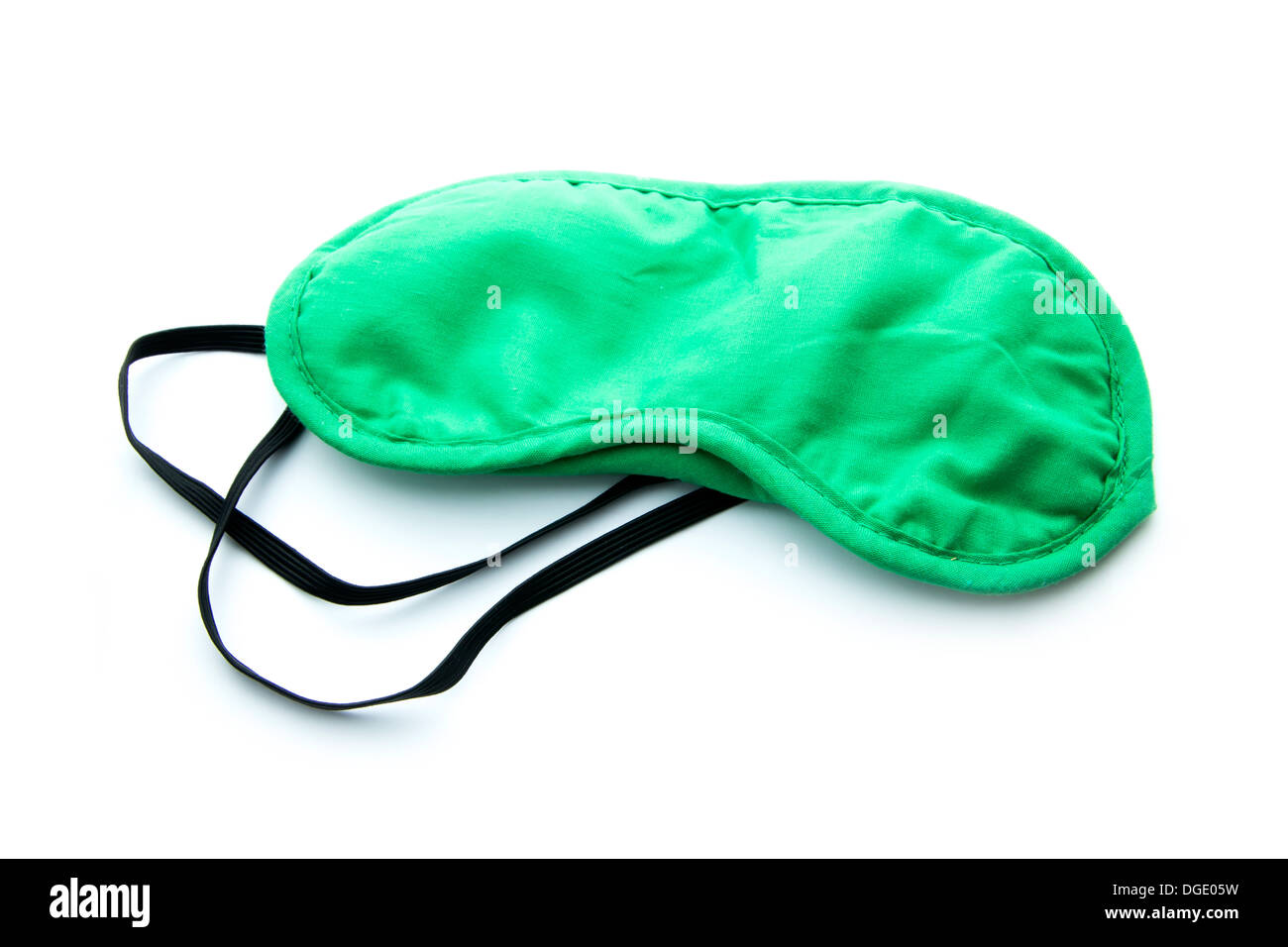 grüne Schlafmaske isoliert auf weißem Hintergrund Stockfoto