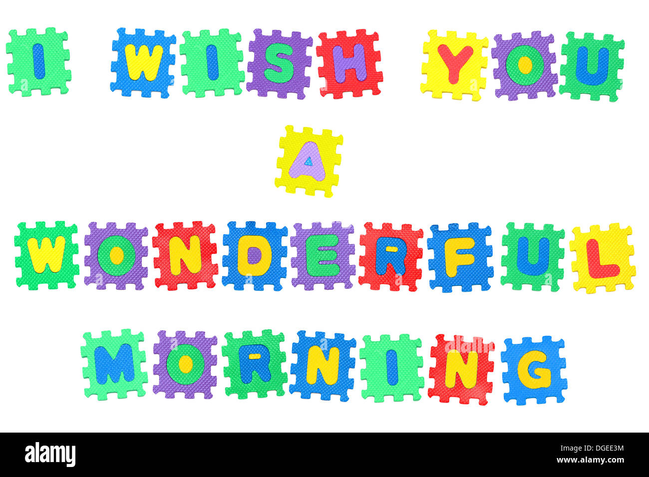 Nachricht, ich wünsche Ihnen einen wunderschönen guten Morgen aus Buchstaben Puzzle, isoliert auf weißem Hintergrund. Stockfoto