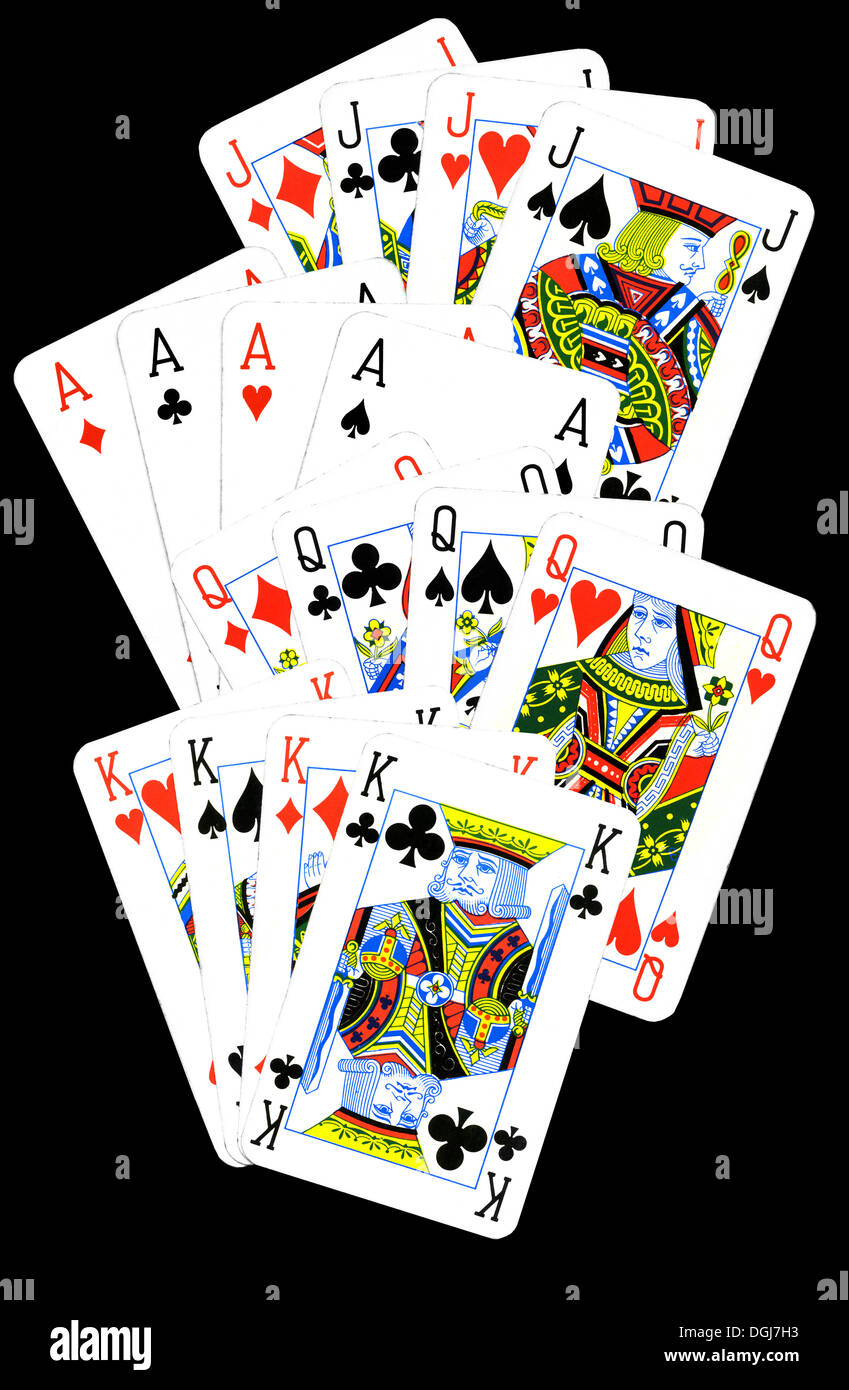 Spielkarten in vier Sätzen von vier einer Art angeordnet. Buben, Damen, Könige und Asse. Stockfoto