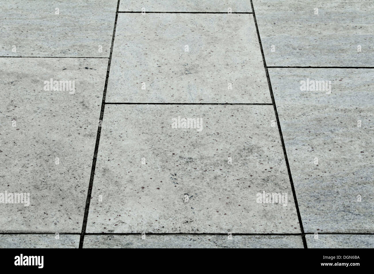 Graue Grunge Boden Stein Symmetrie mit schwarzen Fuge Stockfoto
