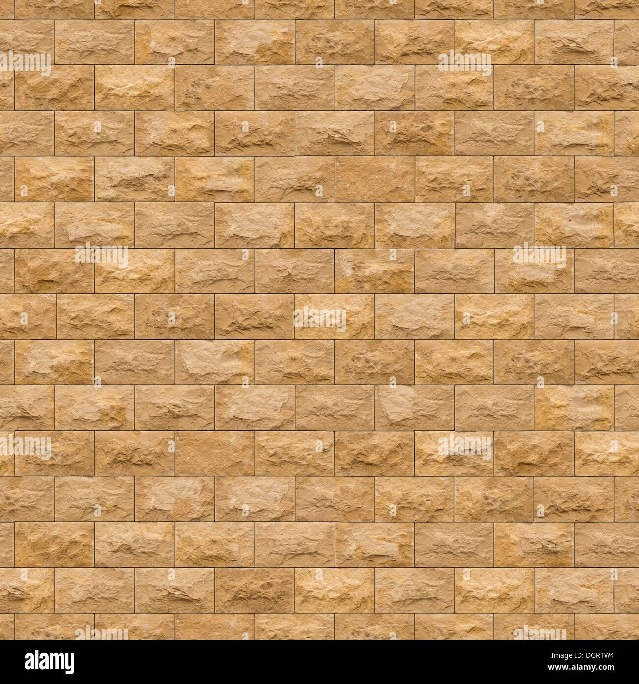 Nahtlose Textur von gelbem Sandsteinmauer. Stockfoto