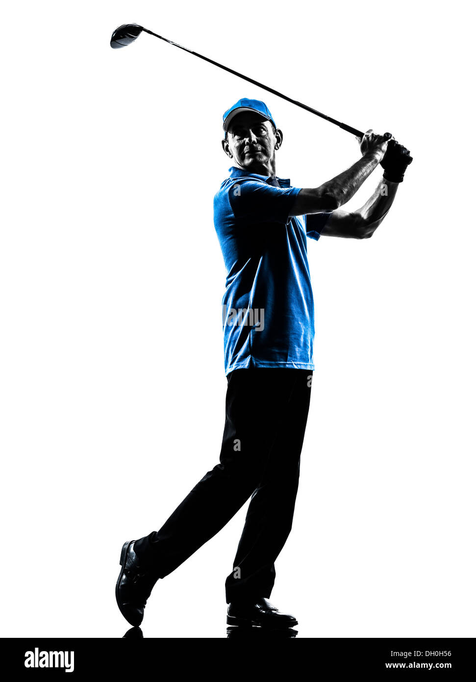 ein Mann Golfer Golfen in Silhouette Studio isoliert auf weißem Hintergrund Stockfoto