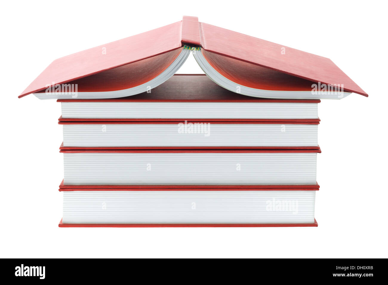 Stapel von dicken roten Büchern auf weißem Hintergrund Stockfoto
