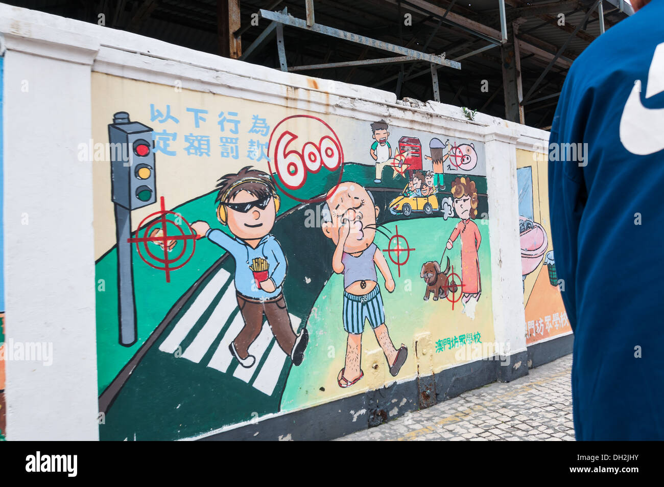 Graffiti auf der Seite eine Mauer in Macau, China. Stockfoto