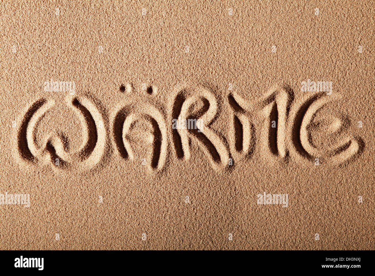 Schreiben in den Sand "WÄRME" oder "HEAT" Stockfoto