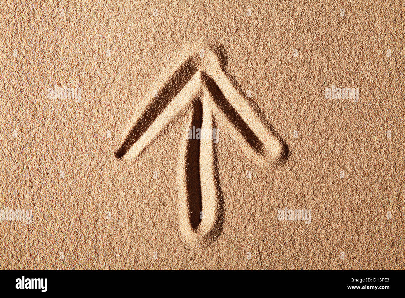 Pfeil, in Sand gezeichnet Stockfoto