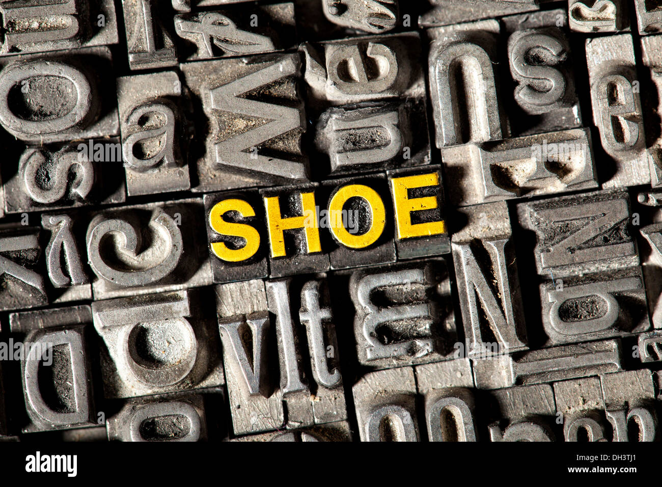 Alten führen Buchstaben bilden das Wort "Schuh" Stockfoto