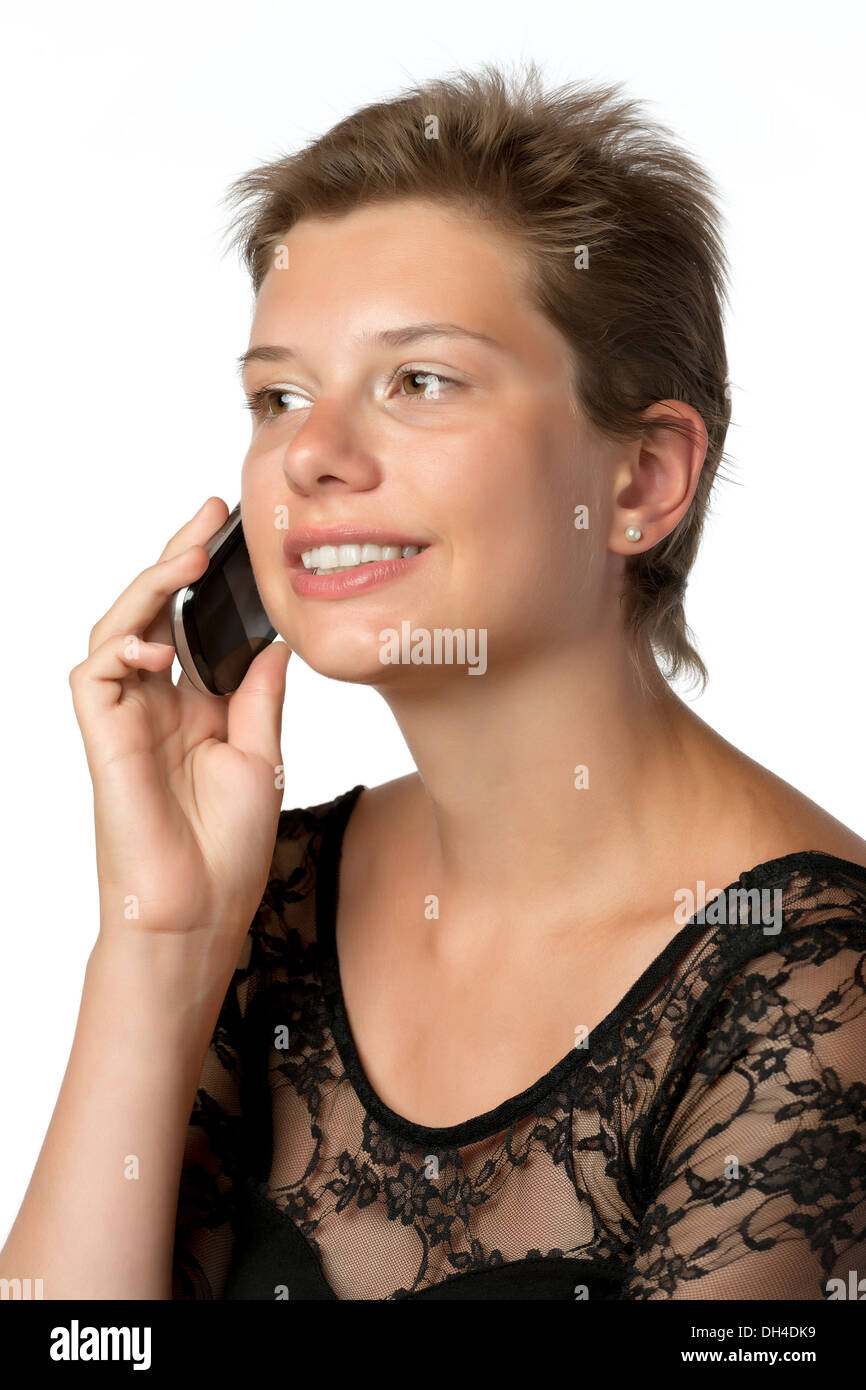 Junge Frau im Abendkleid mit Handy, isoliert auf weißem Hintergrund Stockfoto