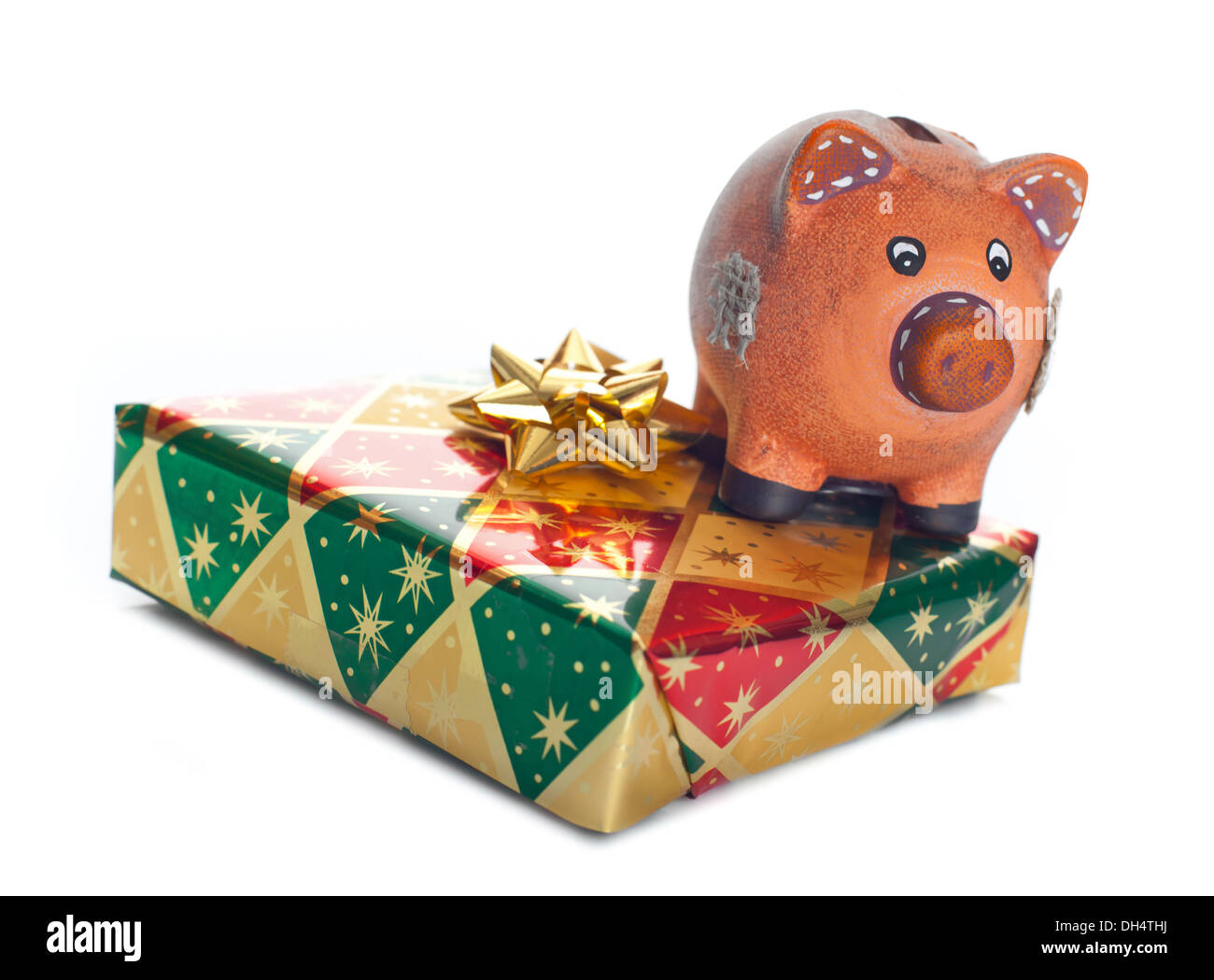 Konzept des Sparens des Geldes auf Geschenke mit Sparschwein Stockfoto