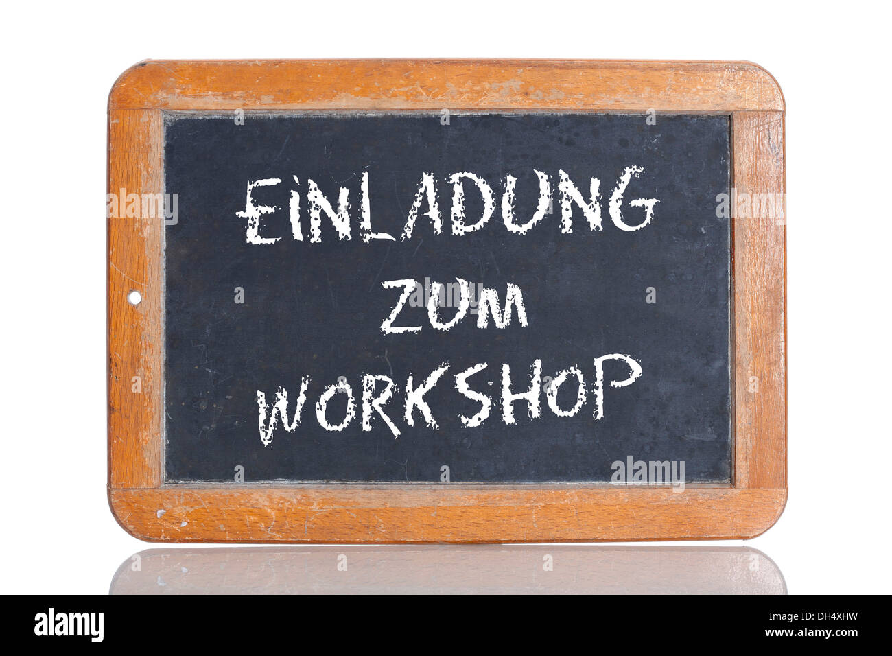 Alte Schultafel mit den Worten EINLADUNG ZUM WORKSHOP, Deutsch für die Einladung zu einem workshop Stockfoto