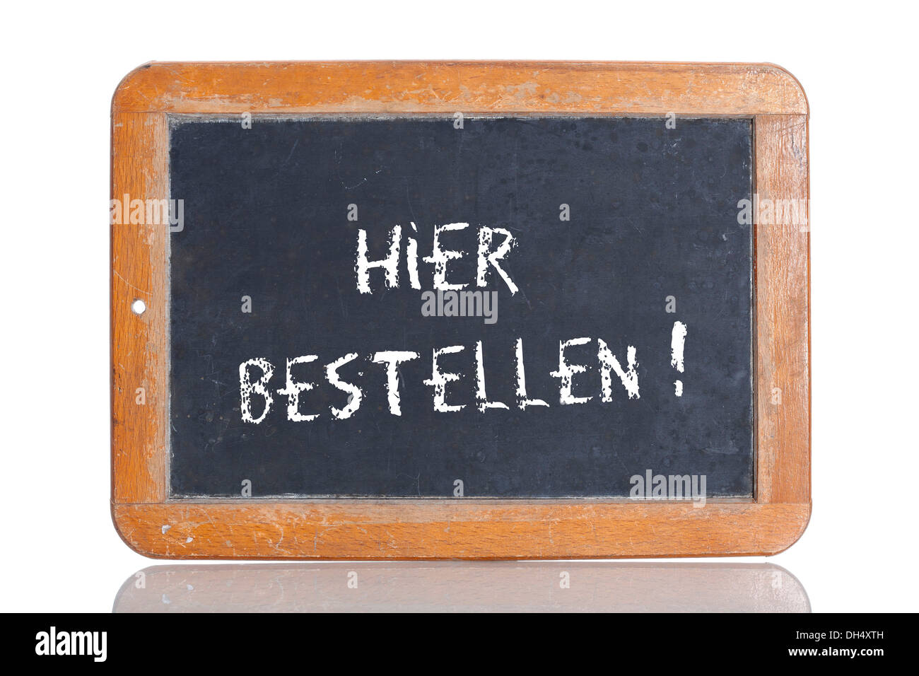 Alte Schultafel mit den Worten HIER ÜBERSETZUNGSFORUM!, Deutsch für hier bestellen! Stockfoto