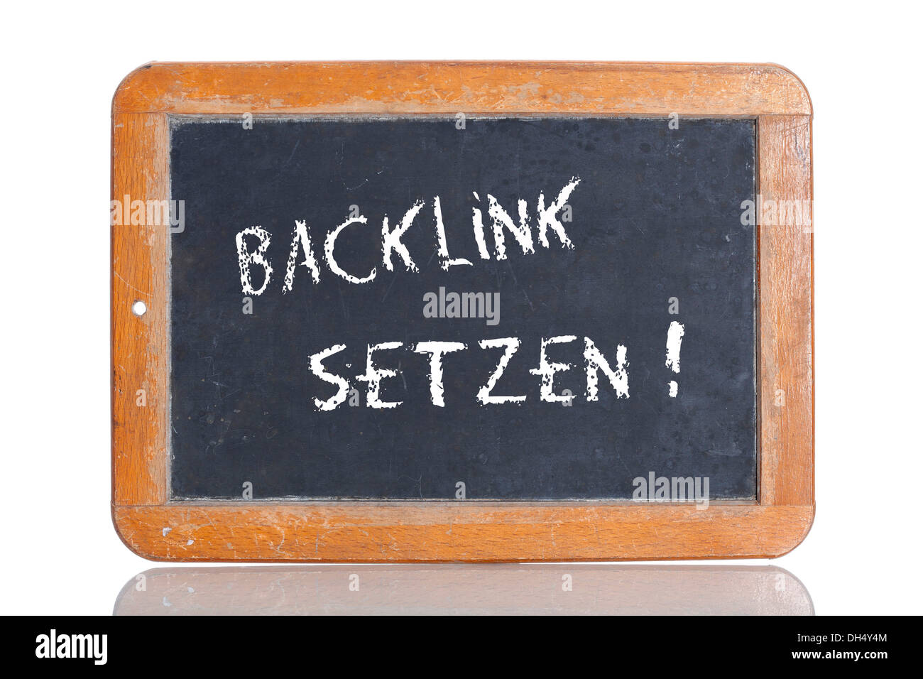 Alte Schultafel mit dem Begriff BACKLINK SETZEN, Deutsch für einen Backlink festlegen Stockfoto