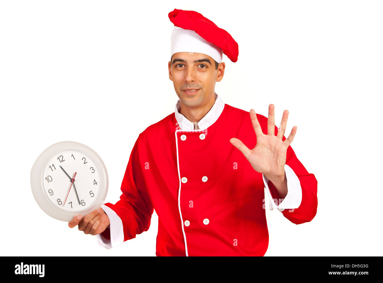 Koch männlich mit Uhr Gestikulieren um fünf Minuten isoliert auf weißem Hintergrund Stockfoto