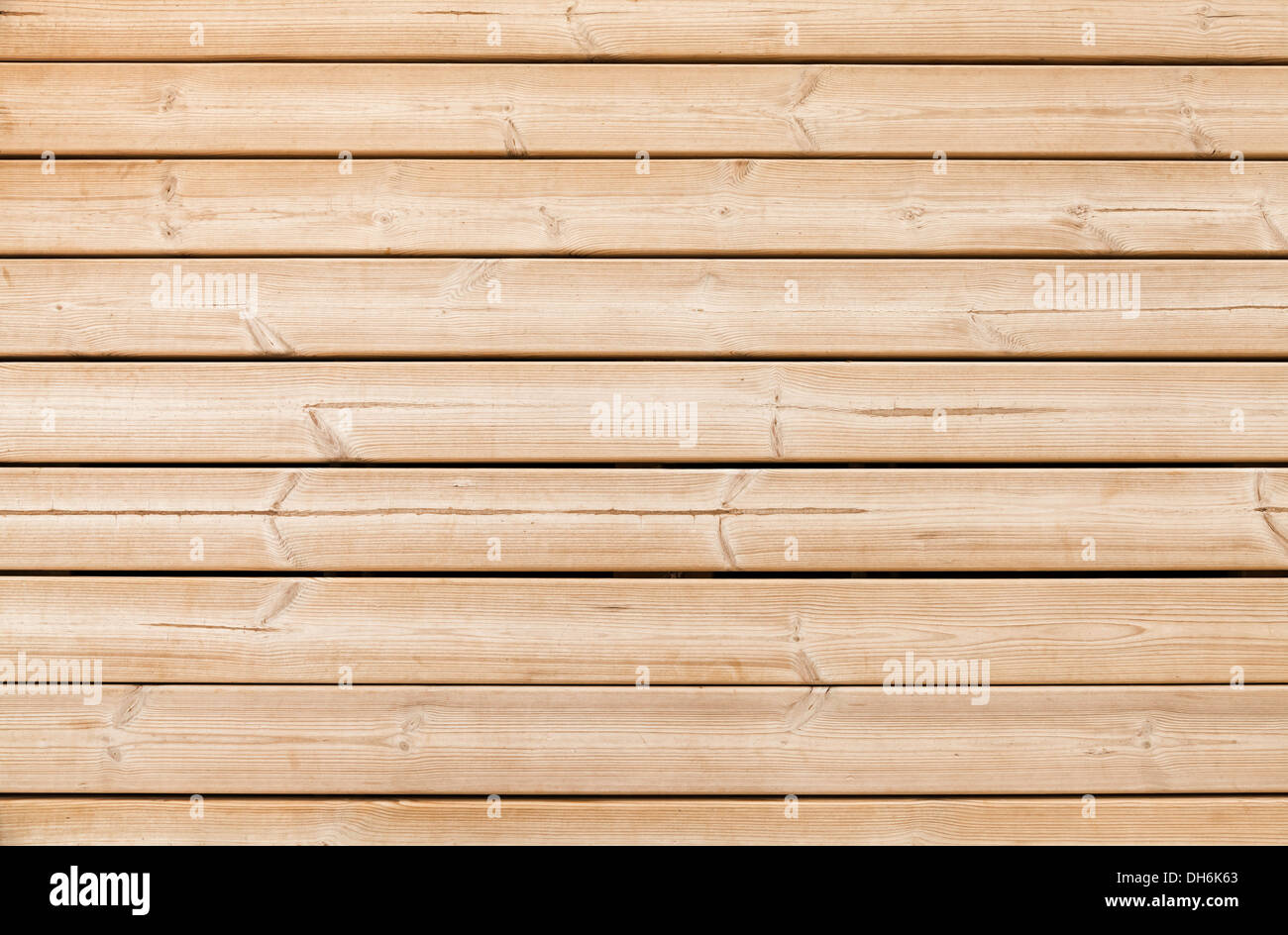 Ungefärbt gelbe Holzwand Closeup Hintergrundtextur Stockfoto