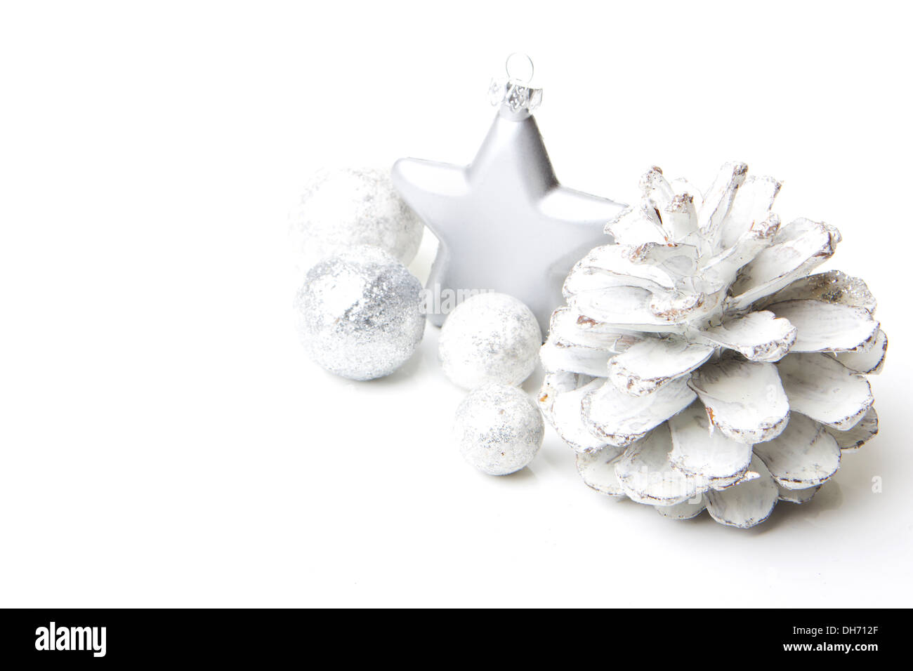 Weihnachten, Dekoration mit Tannenzapfen, Weihnachten Sterne Silber Stockfoto