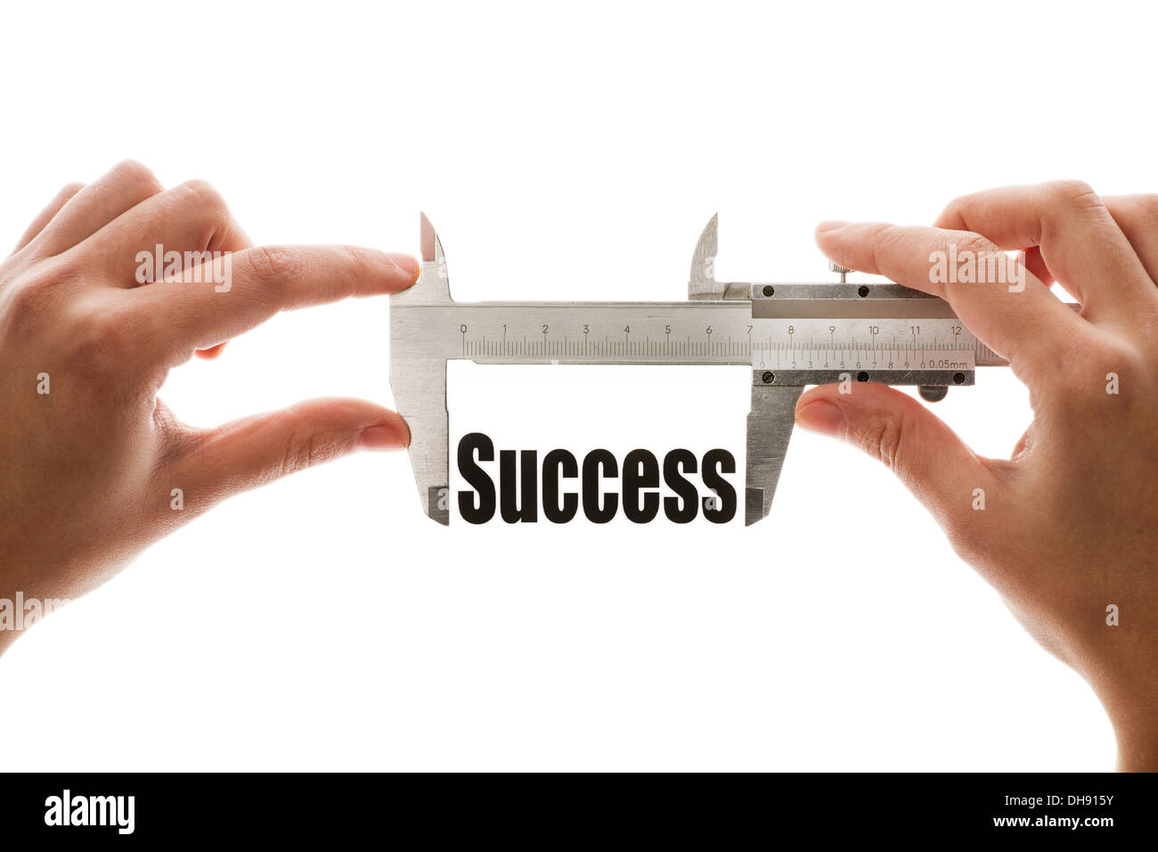 Schuss von einem Bremssattel messen das Wort "Erfolg" hautnah Stockfoto