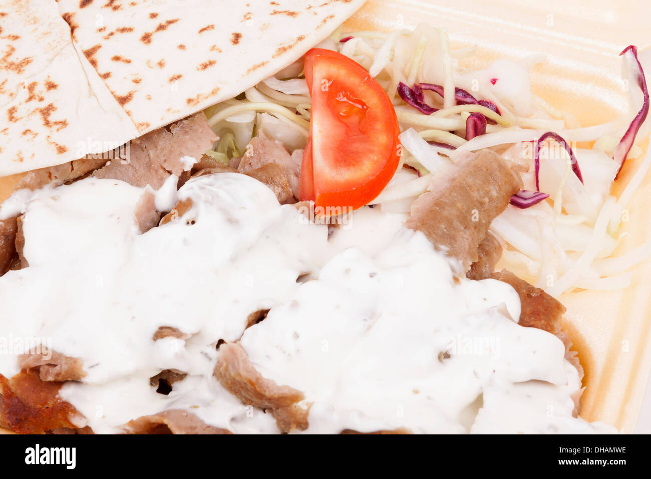 Nehmen Sie Döner, isoliert auf weiss zum mit Stockfoto