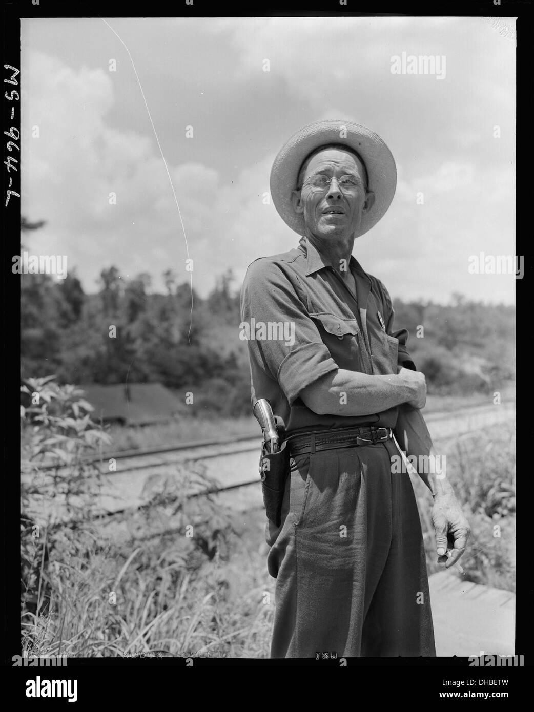 A. T. Tuggle war stellvertretender Sheriff für die Consolidated Coal Company im Bankhead Mine Area im Walker County, Alabama. Dieses Bild unterstreicht seine Rolle bei der lokalen Strafverfolgung innerhalb der Bergbaugemeinde. Stockfoto