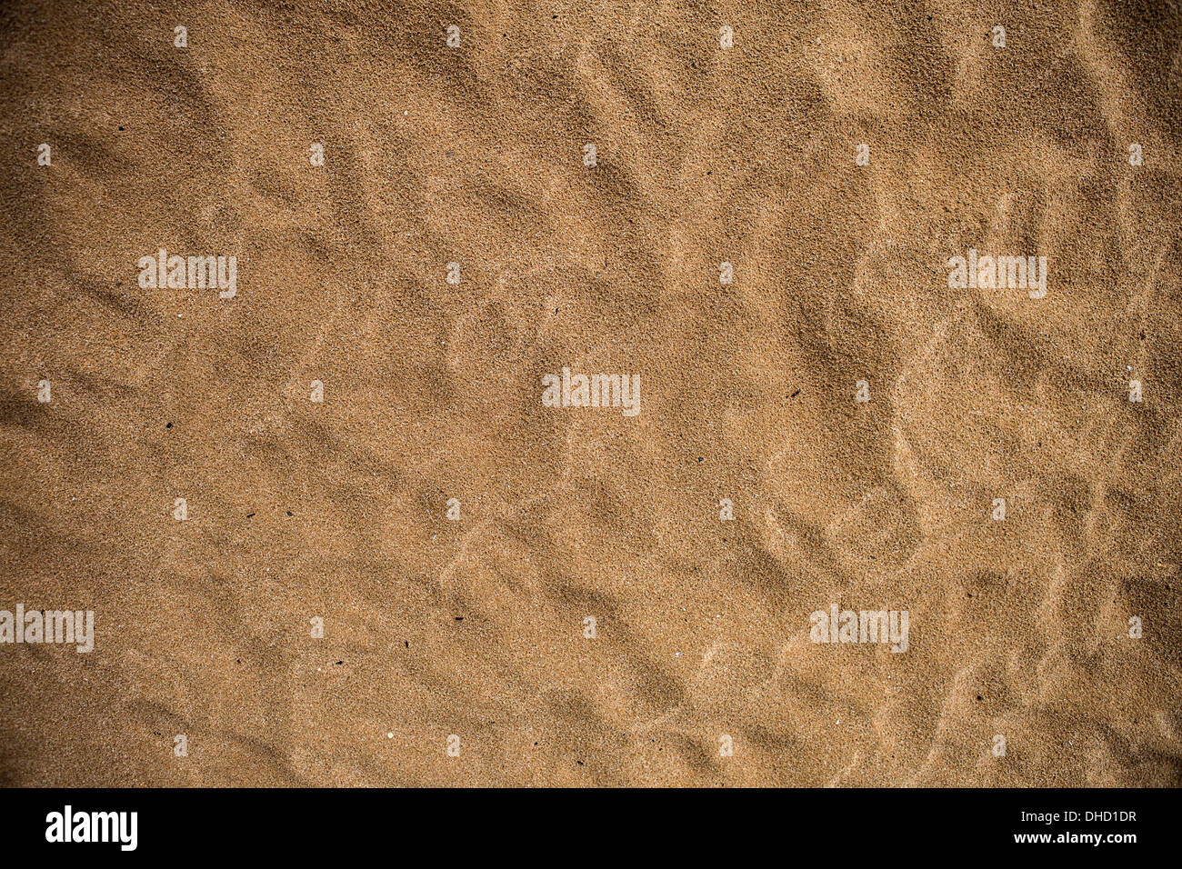 strukturierte Oberfläche der Sand am Strand Stockfoto