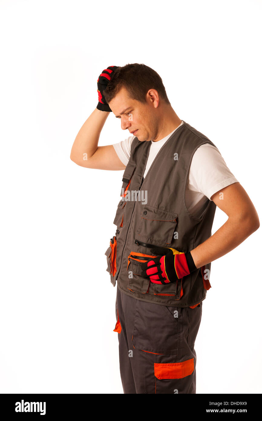 Besorgt Bauarbeiter isoliert auf weißem Hintergrund Stockfoto