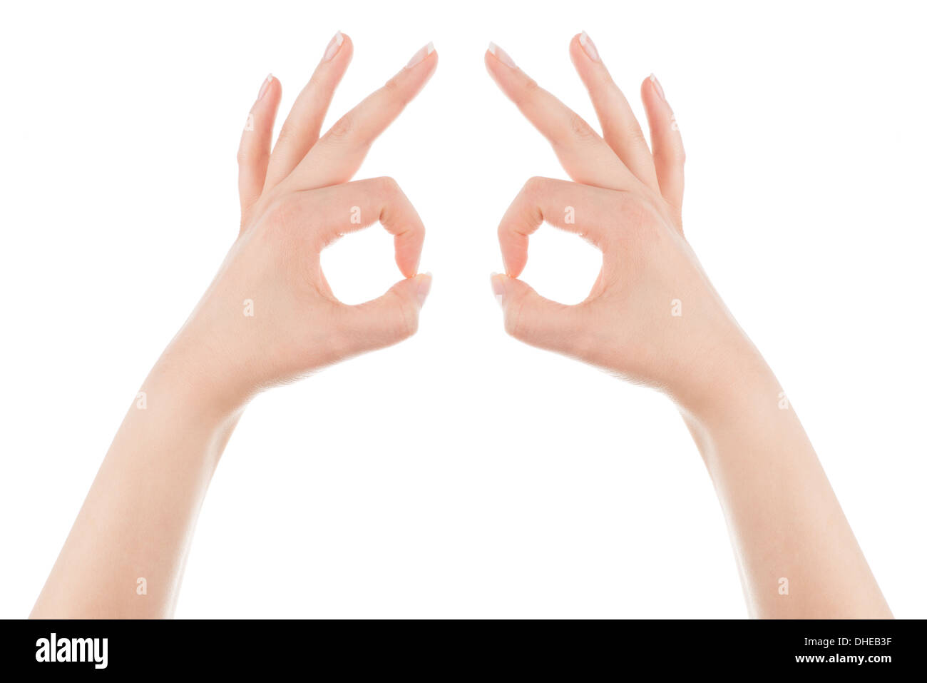 Frauenhand bilden die Maske Geste auf einem weißen Hintergrund. Stockfoto