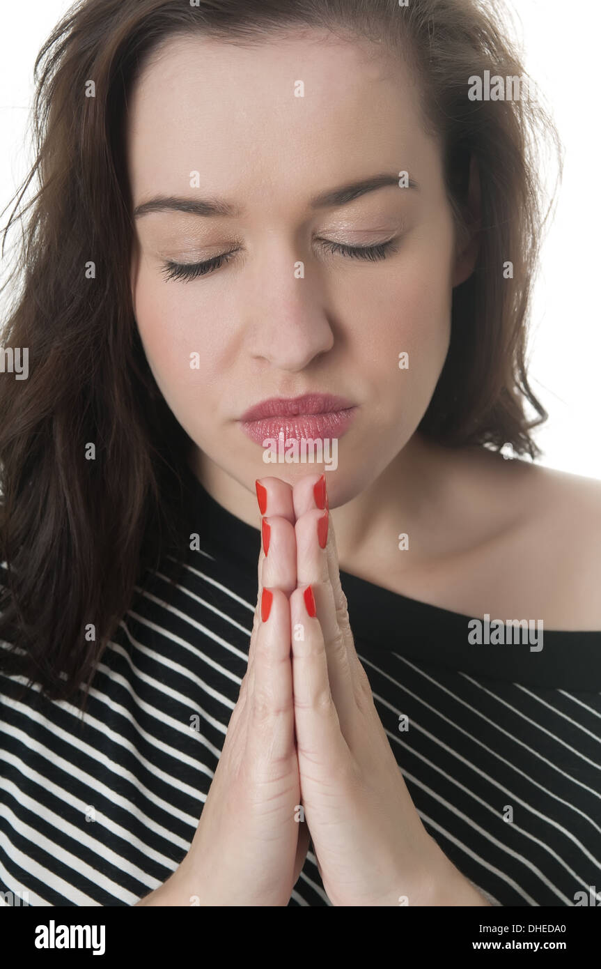 junge Frau beten Stockfoto
