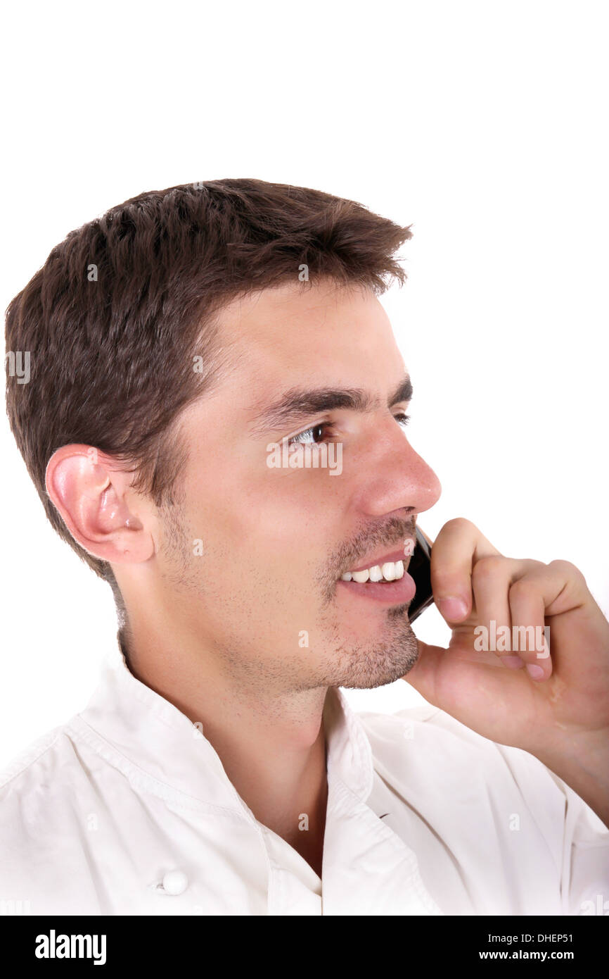Zufriedener Chef am Telefon sprechen und Lächeln Stockfoto