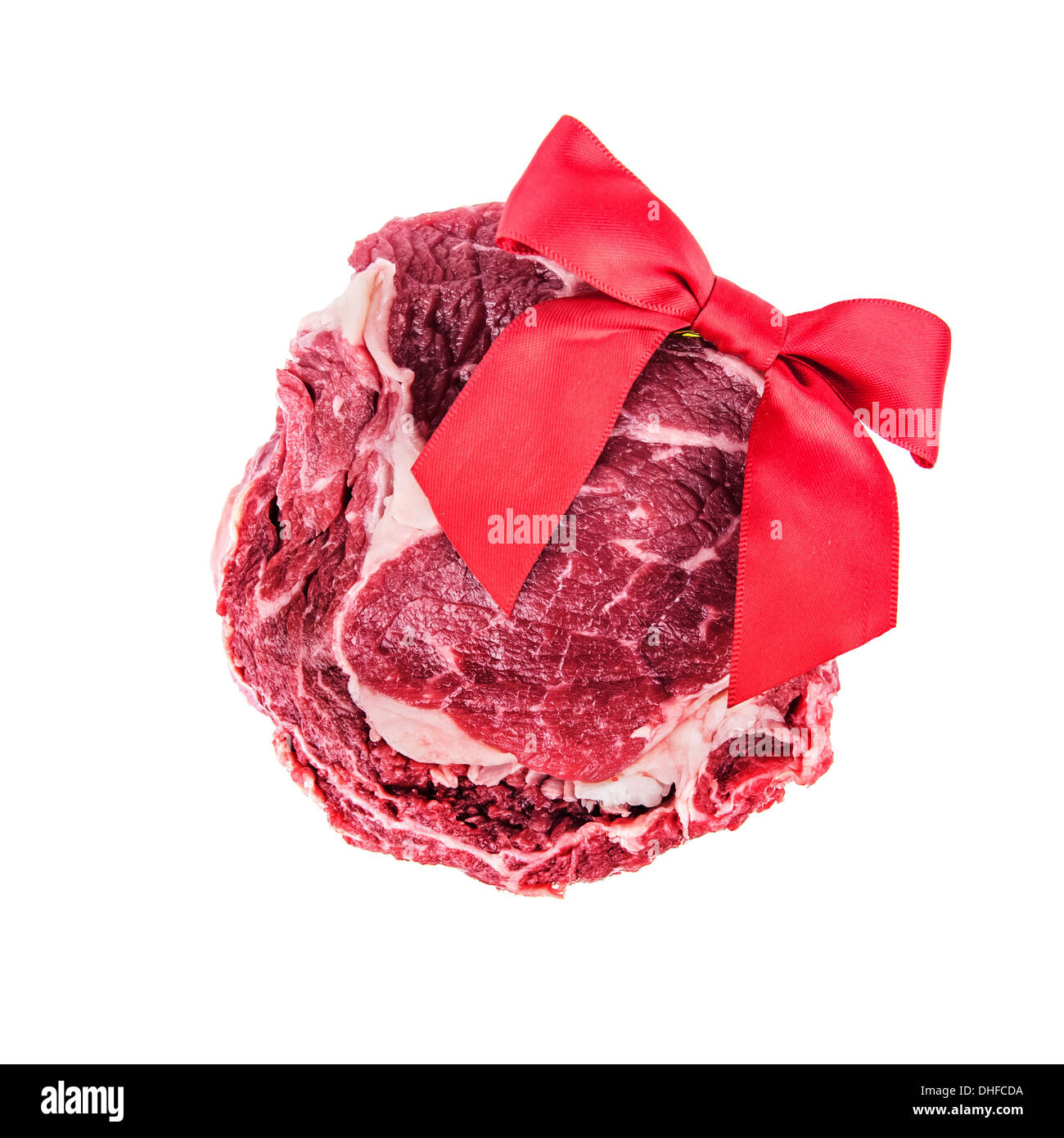 Steak mit roter Schleife isoliert Stockfoto