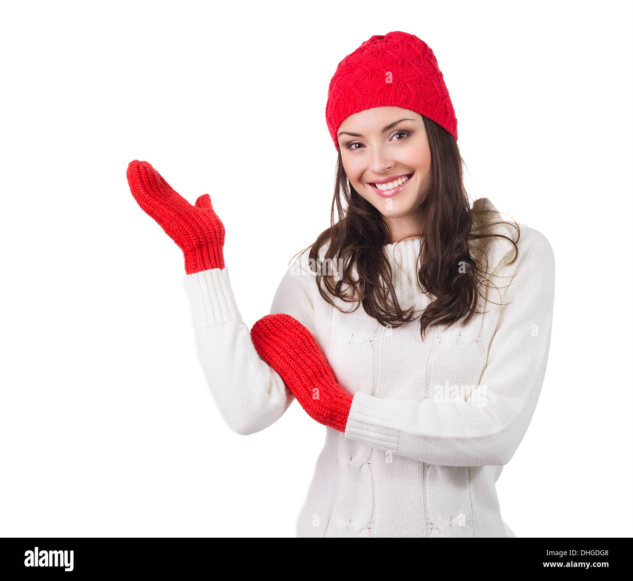 Weihnachten-Frau in warme Kleidung zeigt offene Hand, isoliert auf weiss Stockfoto