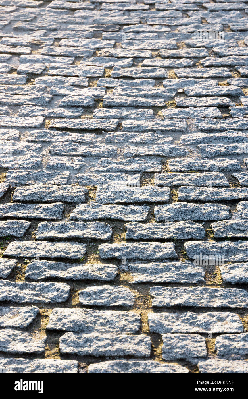 Hintergrund mit Bodenfliesen Granit Pflastersteine Stockfoto