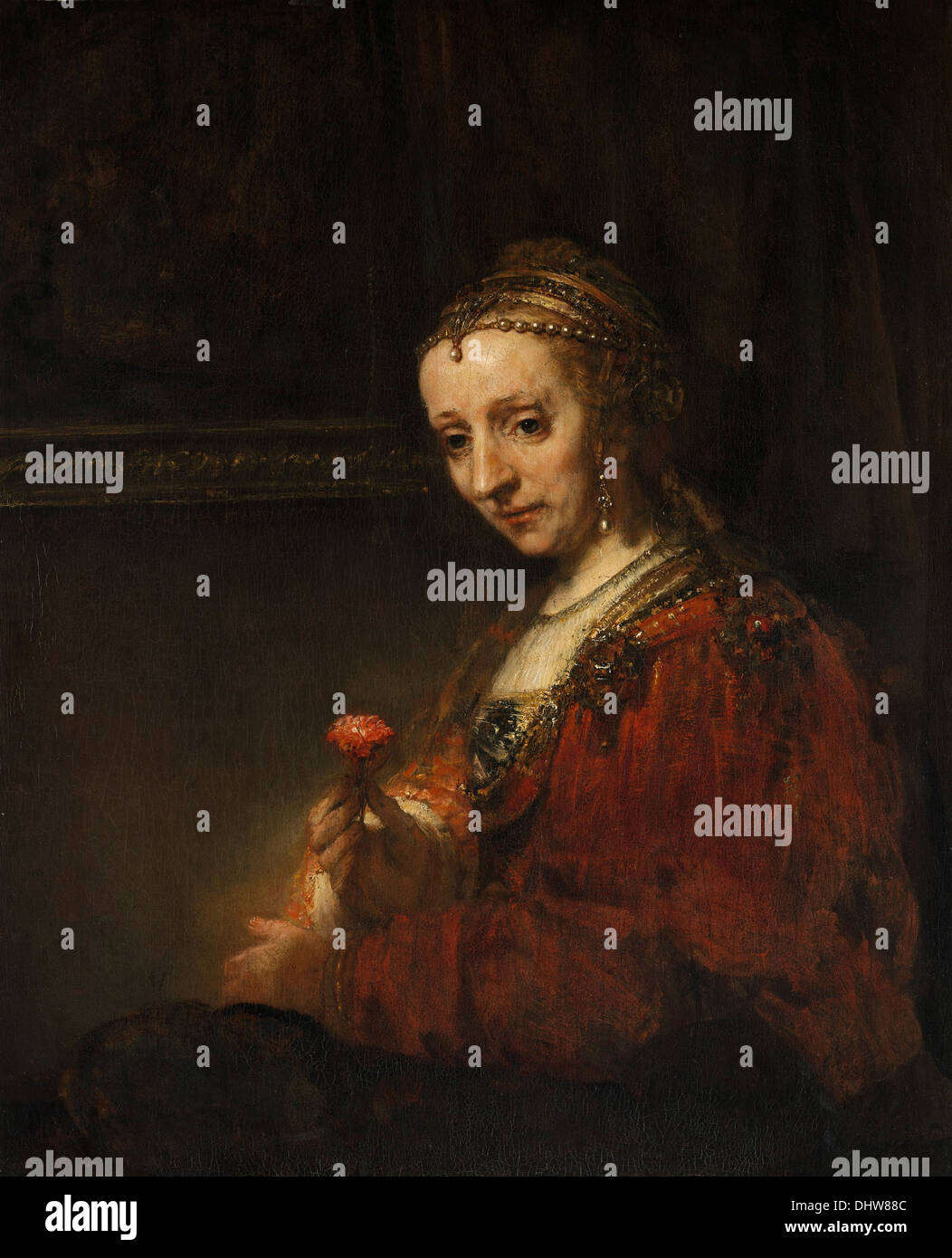 Frau mit einem rosa - von Rembrandt van Rijn, deportiert Stockfoto